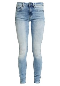 Jeans skinny in denim blu chiaro, con vita alta, cinque tasche, leggero sbiadimento e una texture liscia con una vestibilità aderente.