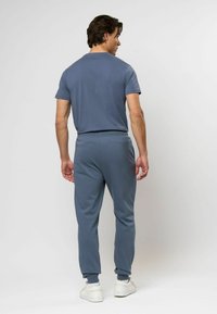 U.S. Polo Assn. Treniņtērpa apakšdaļas - vintage indigo