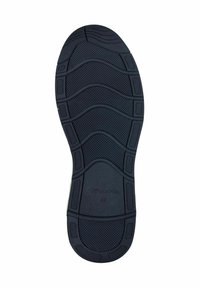 Suola di scarpa in gomma nera con motivo a ondulazione, superficie testurizzata e marchio incassato. Taglia indicata come 42.