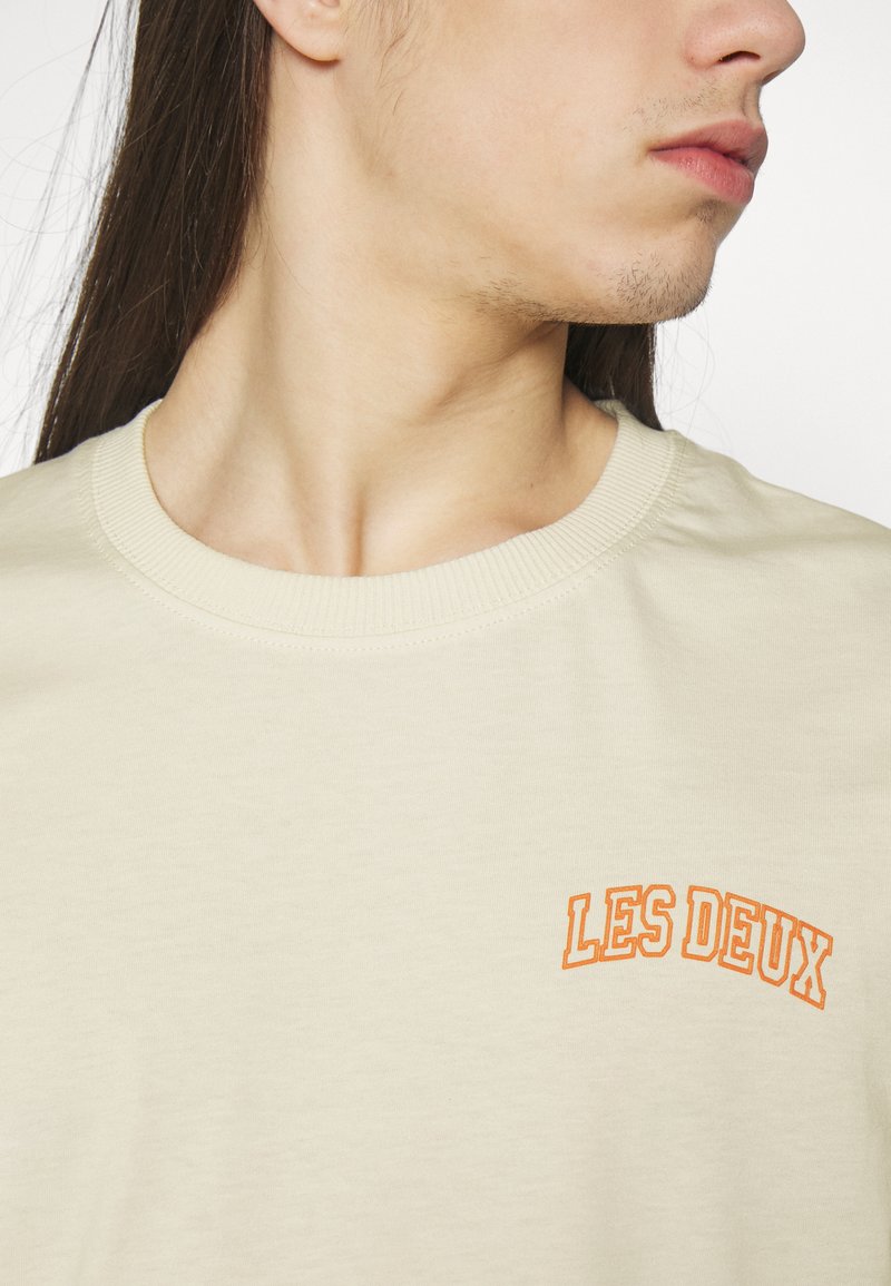 Les Deux BLAKE Camiseta básica orange/crema Zalando.es