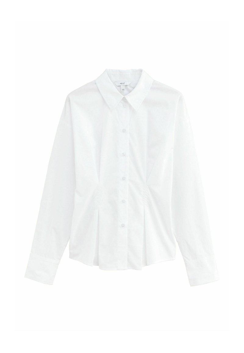 White long-sleeve shirt made of cotton, featuring a button-up front, pointed collar, and pleated hem detail. Smooth texture and classic design.