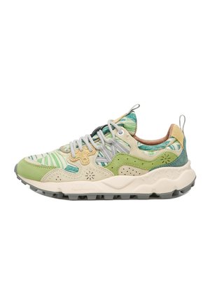 Multicolor sneaker with green and beige suede, patterned fabric upper, white laces, textured sole, and pull tabs on tongue and heel.