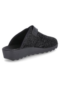 Black slip-on shoe with floral embossed pattern, soft fabric upper, adjustable strap, and textured rubber sole for grip and comfort.