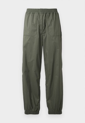 Elastic-waisted cargo pants in dark green, featuring two side pockets, tapered cuffs, and a smooth, lightweight fabric.