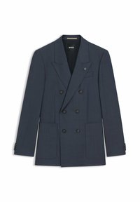 Blazer doppiopetto grigio scuro con ampi risvolti, sei bottoni neri, due tasche applicate frontali e una piccola spilla metallica sul risvolto.
