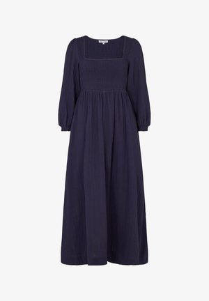 Dark navy dress with a square neckline, long puff sleeves, smocked bodice, and flowing skirt, made from soft, textured fabric.