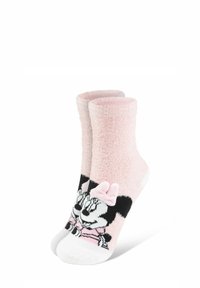 Calzini fluffosi rosa chiaro con un design di Minnie Mouse in bianco e nero e un fiocco rosa sul davanti. Suole bianche testurizzate.