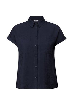 Camicia blu navy a maniche corte con design a bottoni, dotata di due tasche sul petto e un tessuto testurizzato. Silhouette pulita e semplice.