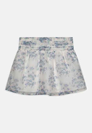 Jupe à motif floral en tissu transparent avec une taille douce. Prédominante blanche avec des nuances pastel de bleu et de vert. Forme évasée, design plissé.