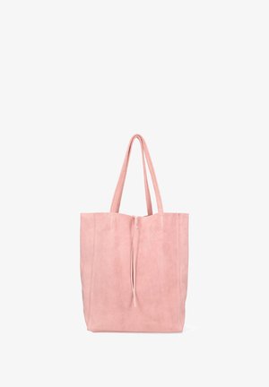 Sac fourre-tout en suède rose avec deux longues poignées, ouverture sur le haut et design minimaliste. Texture douce sans quincaillerie ou motifs visibles.