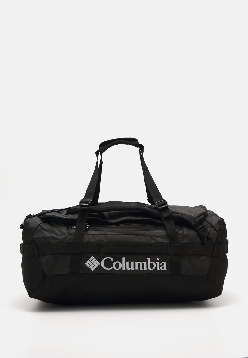 Mala de viagem preta com um tecido durável, duas alças robustas, um compartimento com fecho e um destacado logótipo branco "Columbia".