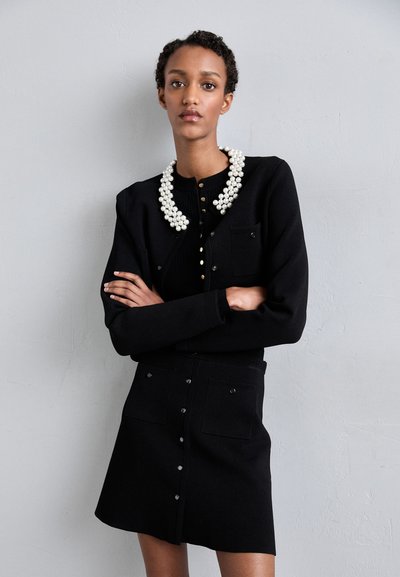 sandro JUPE TRAPEZE POCHES  - Falda acampanada - noir