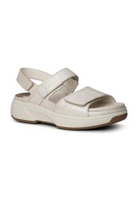 Lichtbeige sandalen met een gestructureerd reptielenpatroon op de bandjes, verstelbare klittenbandsluitingen en een dikke, verdikte zool.