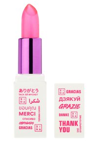 Lipstick in a bright pink shade with a bullet shape. The tube features a shiny purple cap and a white base with multilingual text.