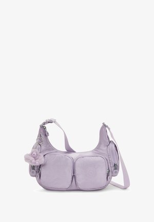 Lilac nylon shoulder bag with two front zippered pockets, adjustable strap, side pouch, and a small fuzzy gorilla keychain attached.