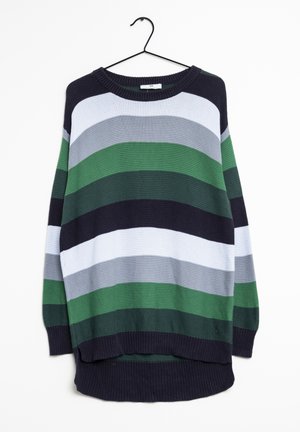 Striped sweater featuring various shades of green, navy, and gray. Ribbed texture with a rounded neckline and dropped hem. Hangs on a black hook.