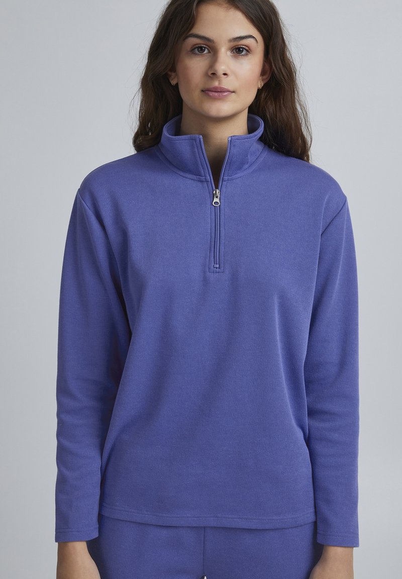 Lila Viertelreißverschluss-Pullover aus strukturiertem Stoff, mit Stehkragen und langen Ärmeln sowie geradem Saum.