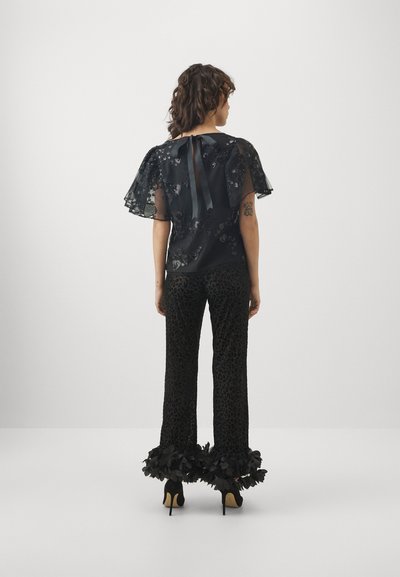 Ida Sjöstedt FOXY TROUSERS - Trousers - black leo