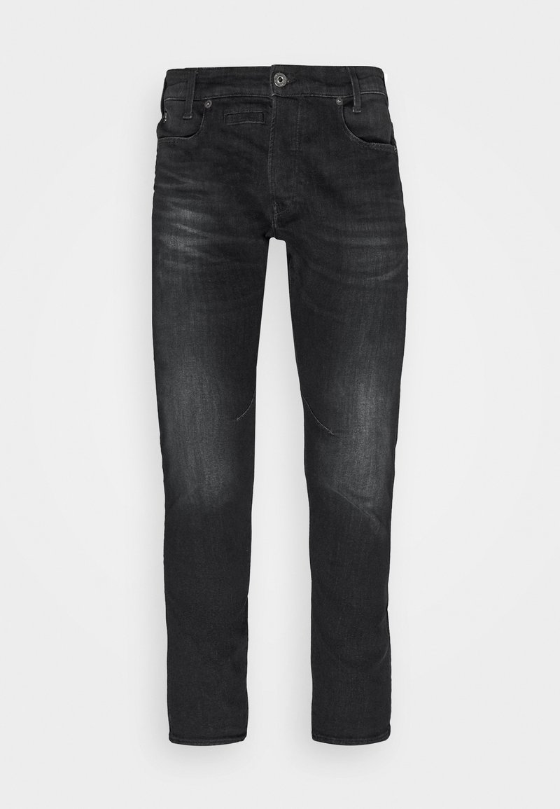 Jean noir slim ajusté avec fermeture par bouton et fermeture éclair, poches avant et arrière, et détails subtils délavés sur les cuisses.