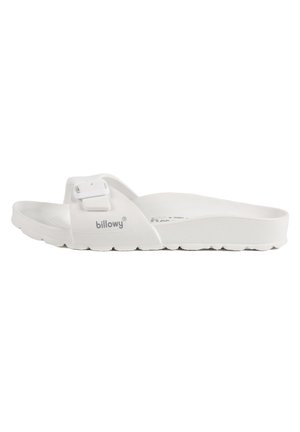 Tongs en caoutchouc blanc avec sangle réglable, semelle intérieure texturée et semelle supérieure striée pour une meilleure adhérence. Nom de la marque imprimé sur le côté.