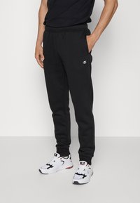 Champion - BASIC CUFF PANTS - Treniņtērpa apakšdaļas - black Miniatūras attēls 1