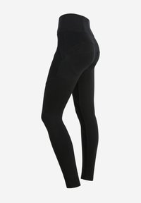 Leggings neri a vita alta con un design aderente, caratterizzati da dettagli delle cuciture, pannelli laterali testurizzati e un tessuto liscio e elastico.