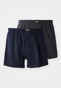 Két pár pamut boxer alsónadrág, az egyik sötétkék, a másik szénszürke, elasztikus derékrésszel és elülső gombdísszel.