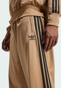 adidas Originals FIREBIRD  - Tracksuit bottoms - cardboard