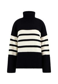 Maglione a righe nere e crema con un alto colletto a dolce vita, maniche larghe e orlo a costine. Il motivo alterna sezioni solide a sezioni a righe.
