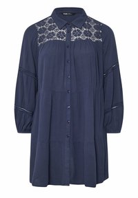 Navy blue shirt dress made of lightweight fabric, featuring a button-down front, lace detailing at the shoulders, and puffed sleeves.