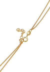 Collier en chaîne dorée avec un design à double brin, un fermoir à homard et des maillons circulaires. Texture lisse avec une finition brillante.