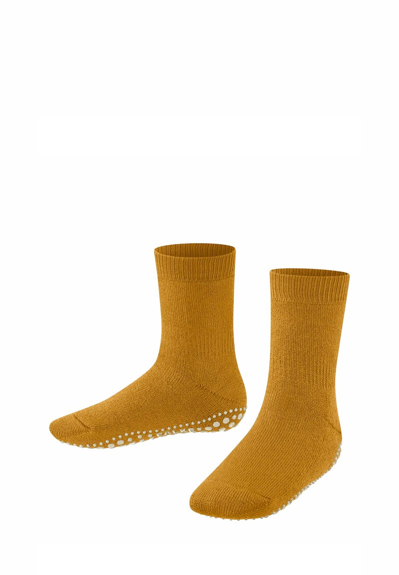 Calzini giallo senape con design a costine, altezza caviglia, dotati di punti antiscivolo bianchi sulla suola per una migliore aderenza. Texture morbida.