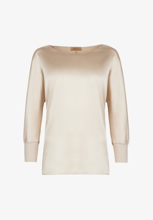 Kremowa satynowa bluzka z okrągłym dekoltem, rękawami do połowy przedramienia i miękką teksturą. Posiada dopasowane mankiety oraz gładki, minimalistyczny design.