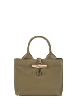 Olive green leather handbag with short handles, a gold toggle closure, and a structured shape. Smooth texture with minimal detailing.