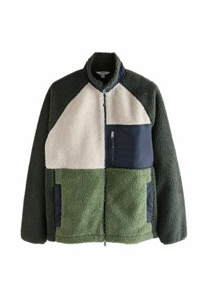 Fleecejakke med grønne og cremefarvede paneler, høj krave, lynlåslukning og en marineblå brystlomme. Tekstureret stof.