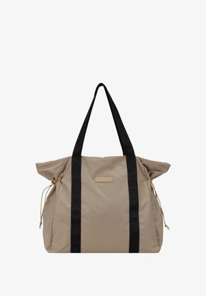 Beige nylon tote bag with black logo straps, featuring a gold-tone plaque, cinched sides, and textured fabric for added depth.