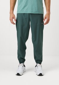 Nike Performance FORM PANT - Joggebukse - vintage green/black/silver