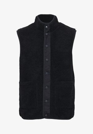 Gilet sans manches noir en polaire avec un col haut, des boutons-pression à l'avant et deux poches sur le devant. Surface texturée avec une finition douce.