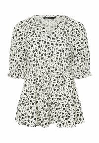 Vit blus med svart blommönster, v-ringning, trekvartslånga ärmar och volangbotten. Tillverkad av lätt tyg med en mjuk textur.