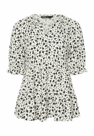 White blouse with black floral print, v-neckline, three-quarter sleeves, and ruffled hem. Made of lightweight fabric with a soft texture.