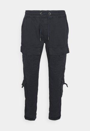 Pantaloni cargo neri con vita elastica, coulisse, multiple tasche con patta sulle cosce e cinturini regolabili alle caviglie.