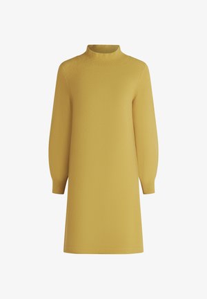 Żółta dzianinowa sukienka z wysokim dekoltem, długimi bufkami i luźnym krojem. Gładka tekstura i długość do połowy uda. Bez wzorów ani akcentów.