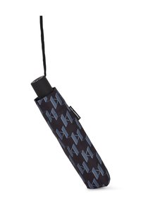 Black umbrella sleeve with a geometric blue pattern, featuring a black handle at the top and a label displaying the brand name.