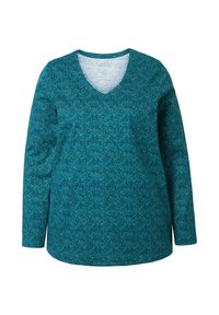 Teal långärmad topp med V-ringning, med en texturerad mönster av små prickar och en avslappnad passform. Mjuk tyg, fållade ärmar och nederkant.