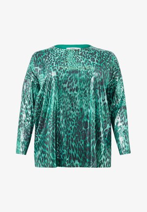 Groene pailletten top met een losse pasvorm, lange mouwen en een luipaardprint. De stof heeft een glanzend, textuurachtig oppervlak.