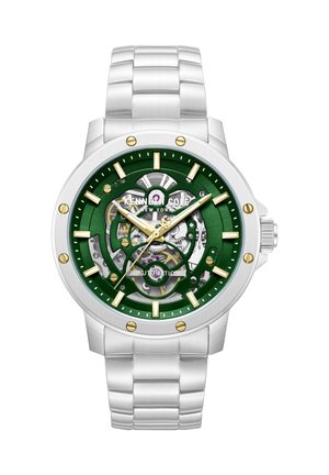 Sølvfarvet metalur med grøn skeletskive, guld timeangivelser og visere, der viser kl. 10:09, mærket Kenneth Cole New York, automatisk urværk synligt.