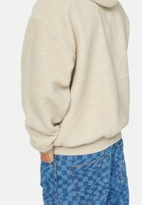 Karl Kani Fleecejacka - beige