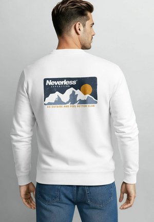 White sweatshirt with a crew neck featuring a graphic of mountains and a sun, with "Neverless Expedition" and a motivational phrase below.