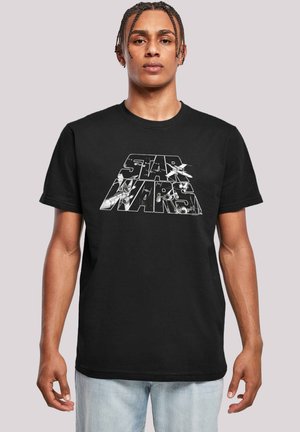 Schwarzes Baumwoll-T-Shirt mit einem großen weißen Grafikdesign des "Star Wars"-Logos und Raumschiff-Designs. Rundhalsausschnitt, kurze Ärmel.
