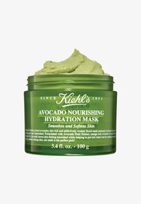 Grüner Behälter der Kiehl's Avocado Nourishing Hydration Mask mit sichtbarem, texturiertem grünen Produkt, beschriftet mit weißem und gelbem Text, 100 ml.